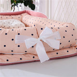 Nido pieghevole in cotone premium