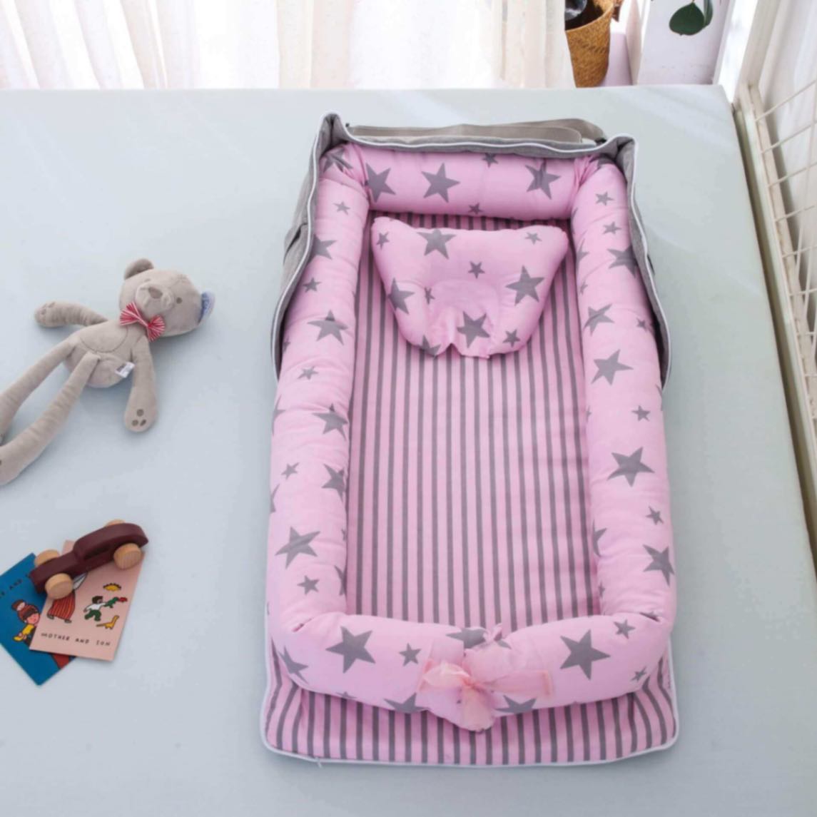 Nido pieghevole in cotone premium