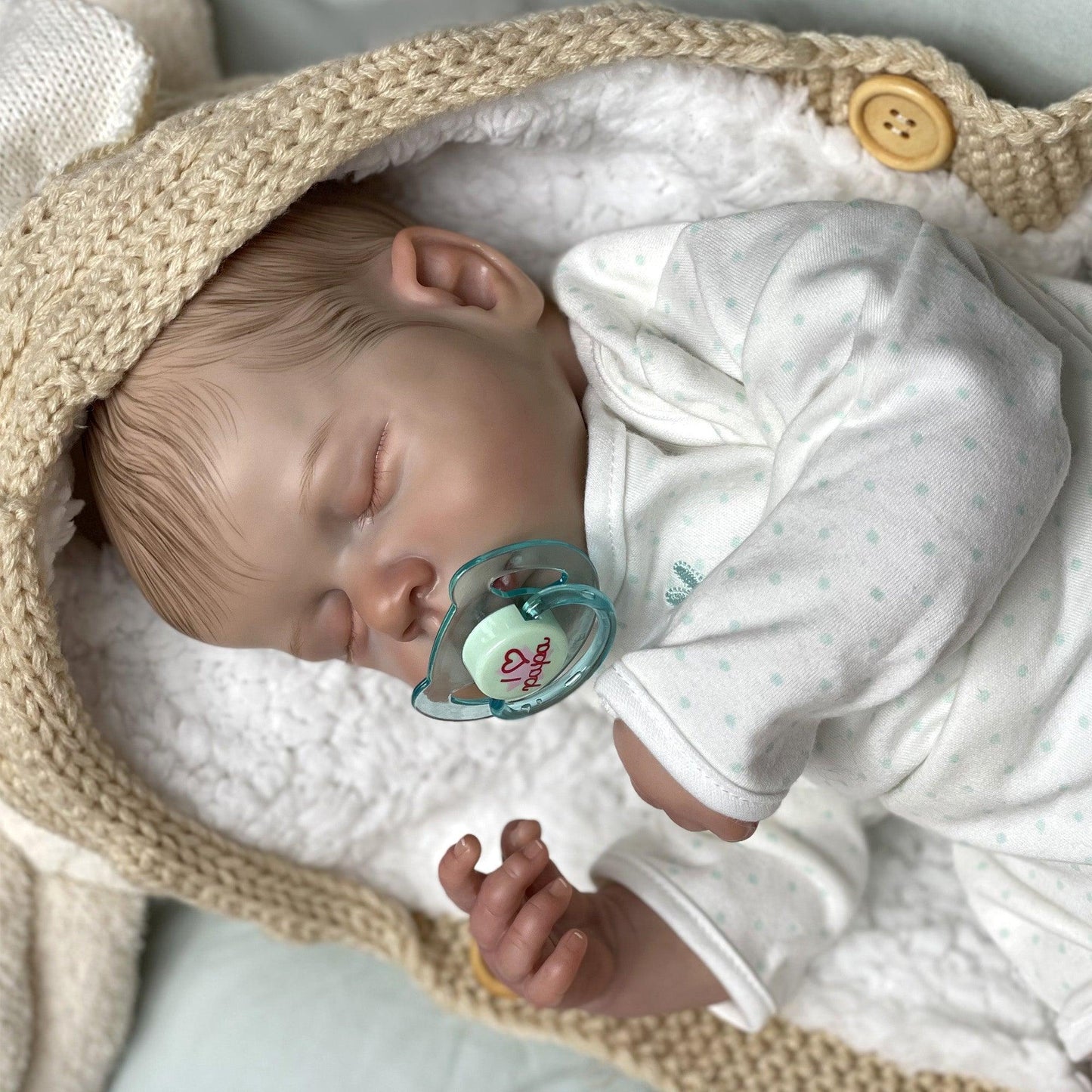 Reborn baby boy with closed eyes - Leo