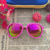 occhiali da sole colorati per bambini