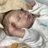 Reborn baby boy with closed eyes - Leo