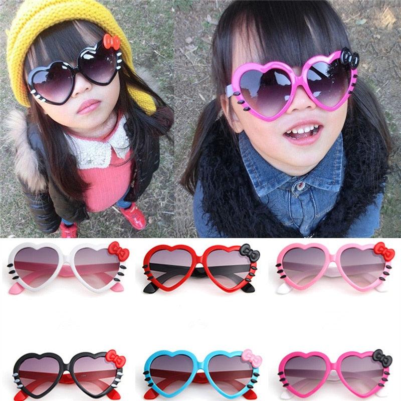 Lunette de soleil en coeur et noeud de papillon