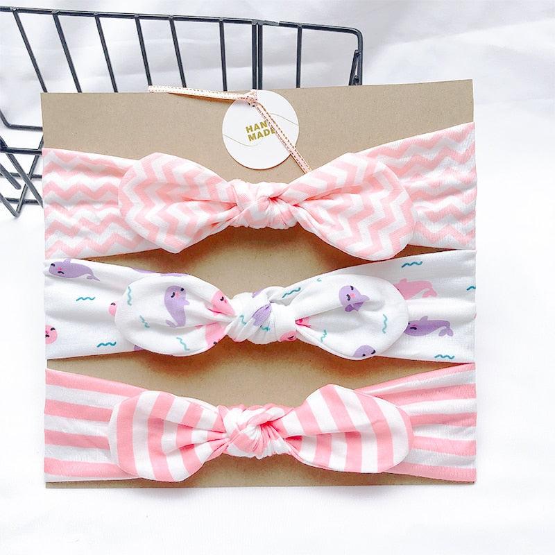 Bandeau fille motifs rose (lot de 3)