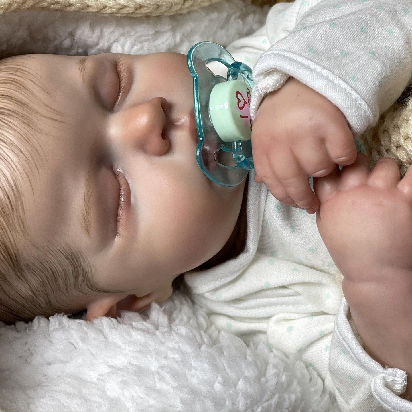 Reborn baby boy with closed eyes - Leo