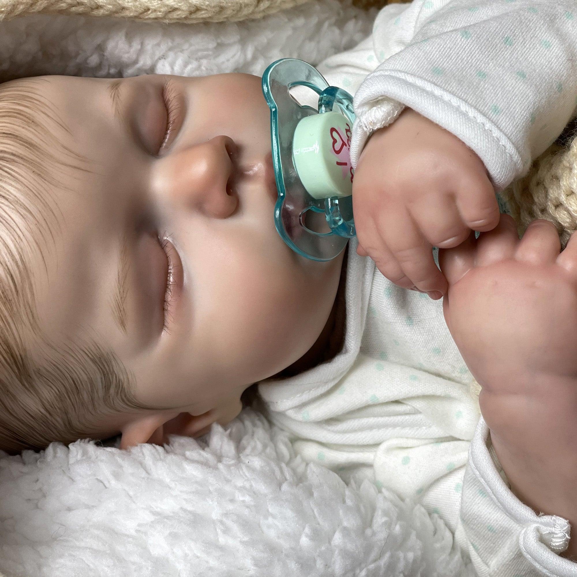 Reborn baby boy with closed eyes - Leo