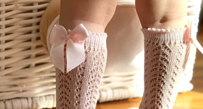 Calzini alti a farfalla per neonata