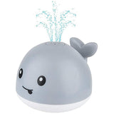 Light-up whale bath toy