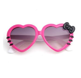 Lunette de soleil en coeur et noeud de papillon