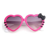 Lunette de soleil en coeur et noeud de papillon