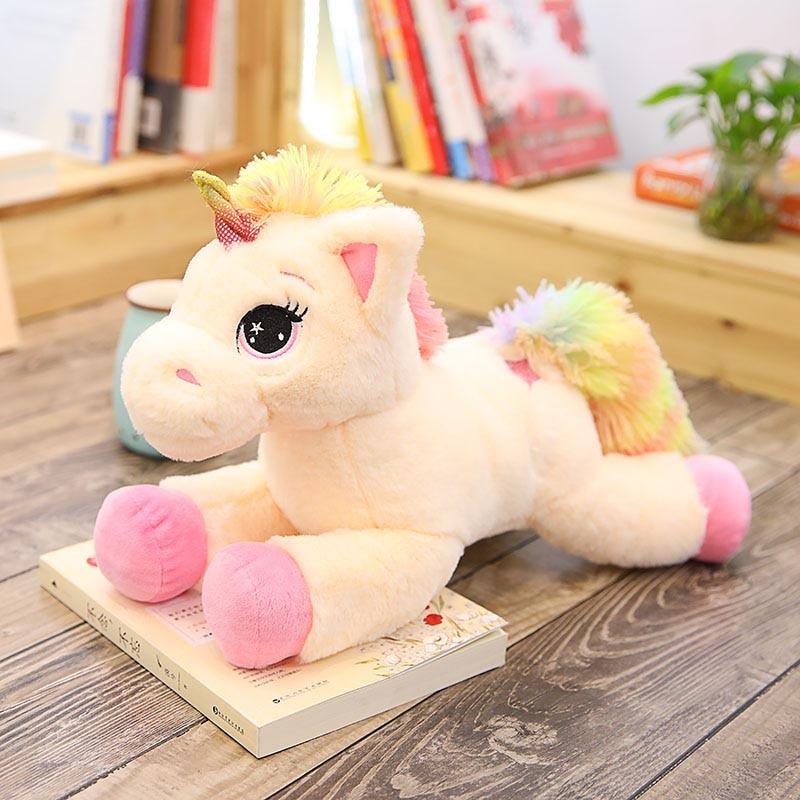 Unicorno di peluche per bambino
