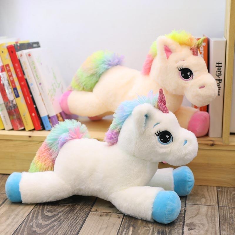 Unicorno di peluche per bambino