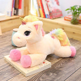 Unicorno di peluche per bambino