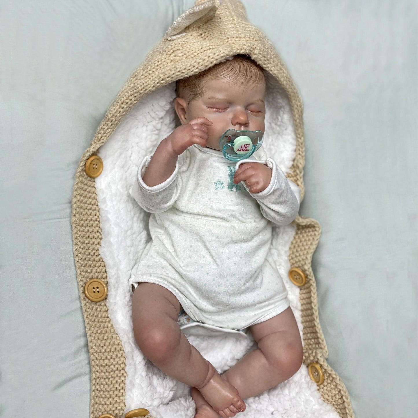 Reborn baby boy with closed eyes - Leo