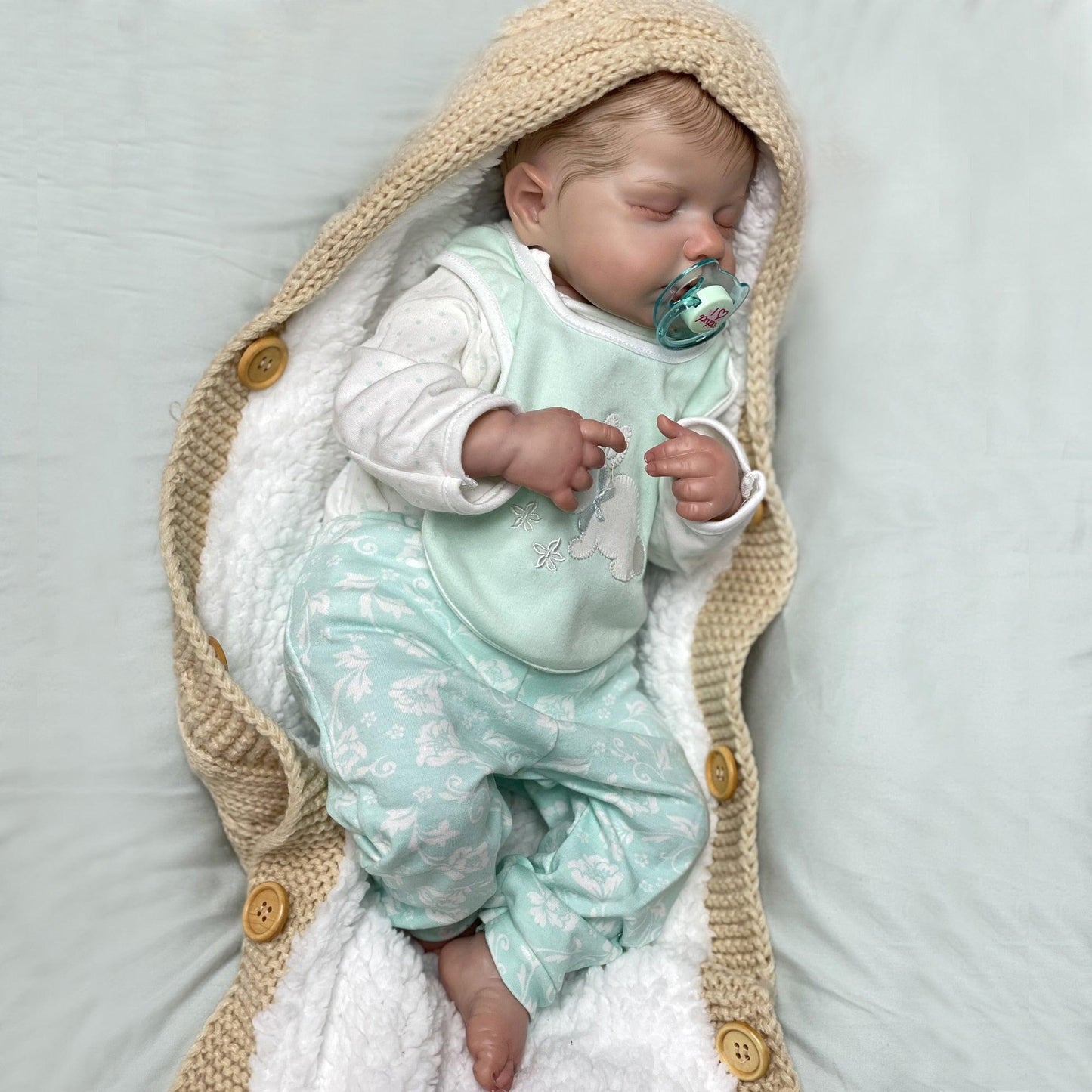 Reborn baby boy with closed eyes - Leo