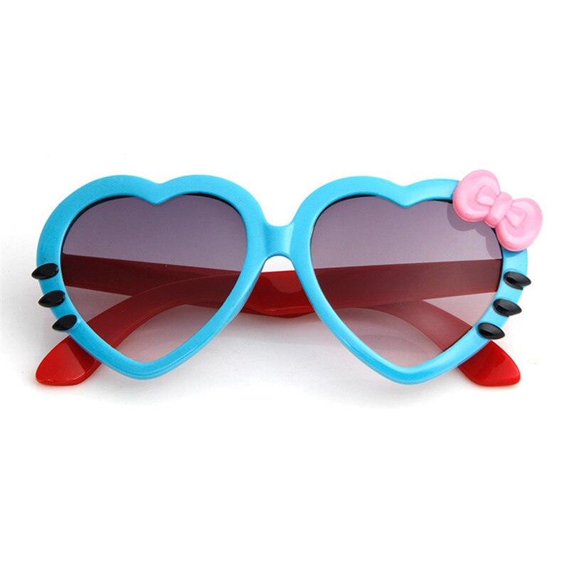 Lunette de soleil en coeur et noeud de papillon