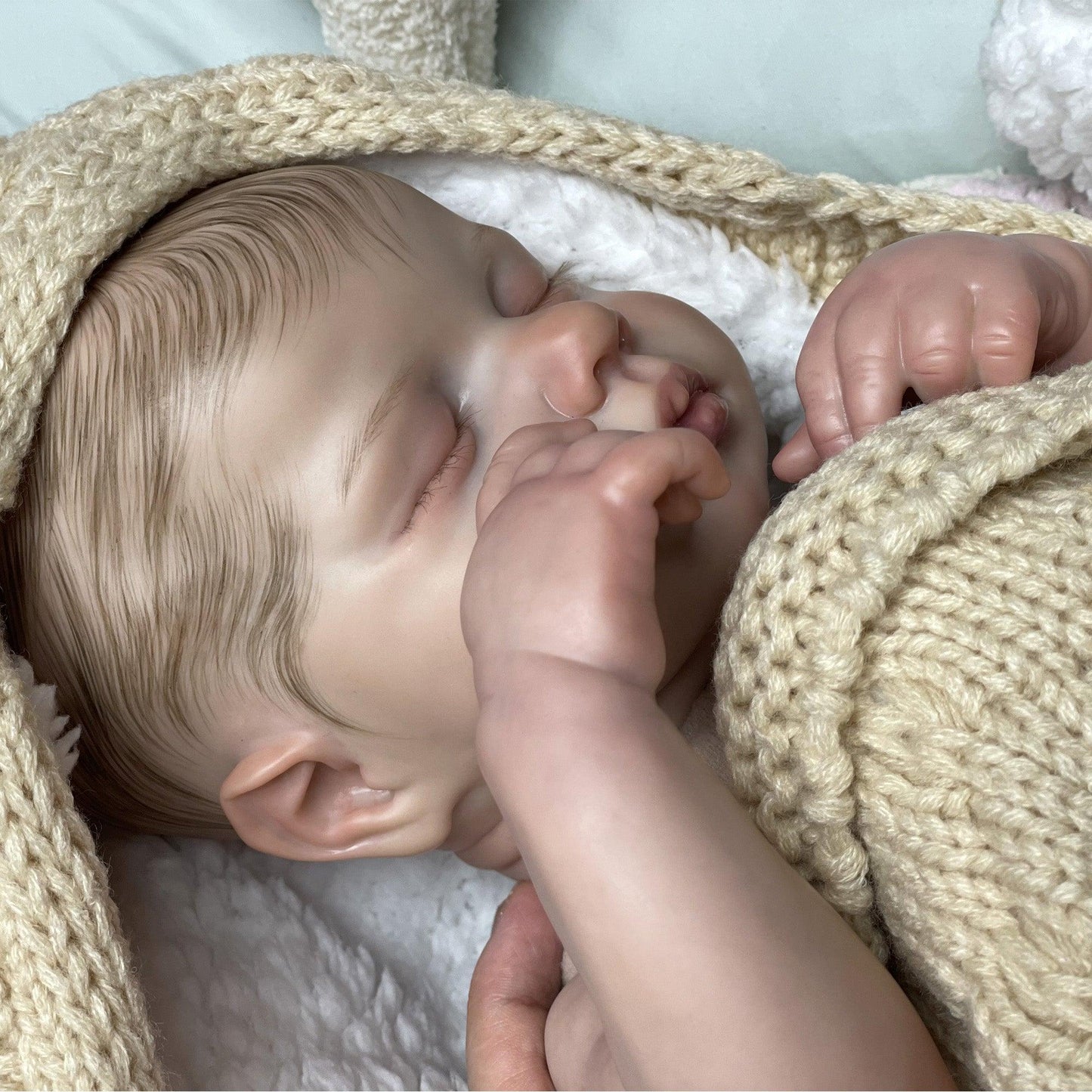 Reborn baby boy with closed eyes - Leo