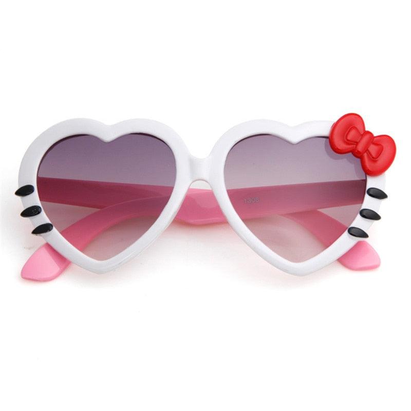 Lunette de soleil en coeur et noeud de papillon