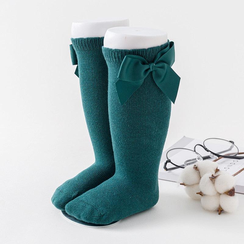 Paire de chaussette verte avec noeuds de papillon