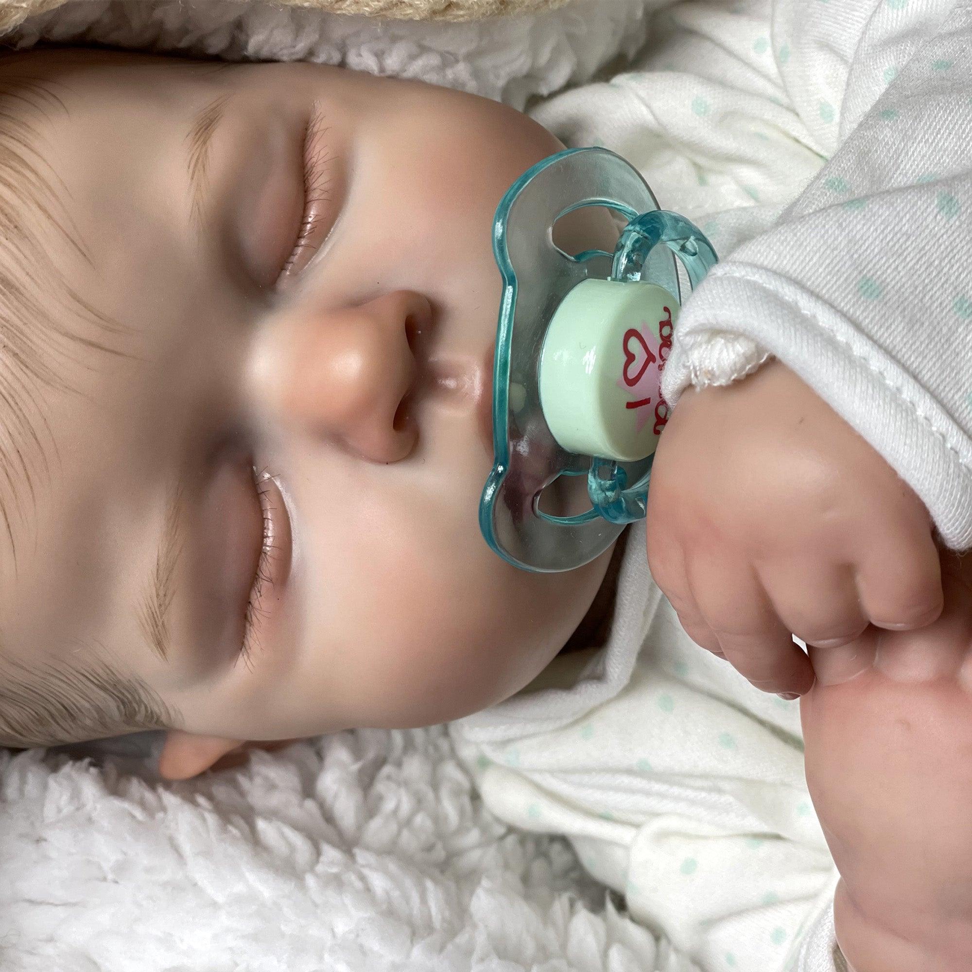 Reborn baby boy with closed eyes - Leo