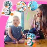 Giocattolo musicale a forma di pinguino gattonante