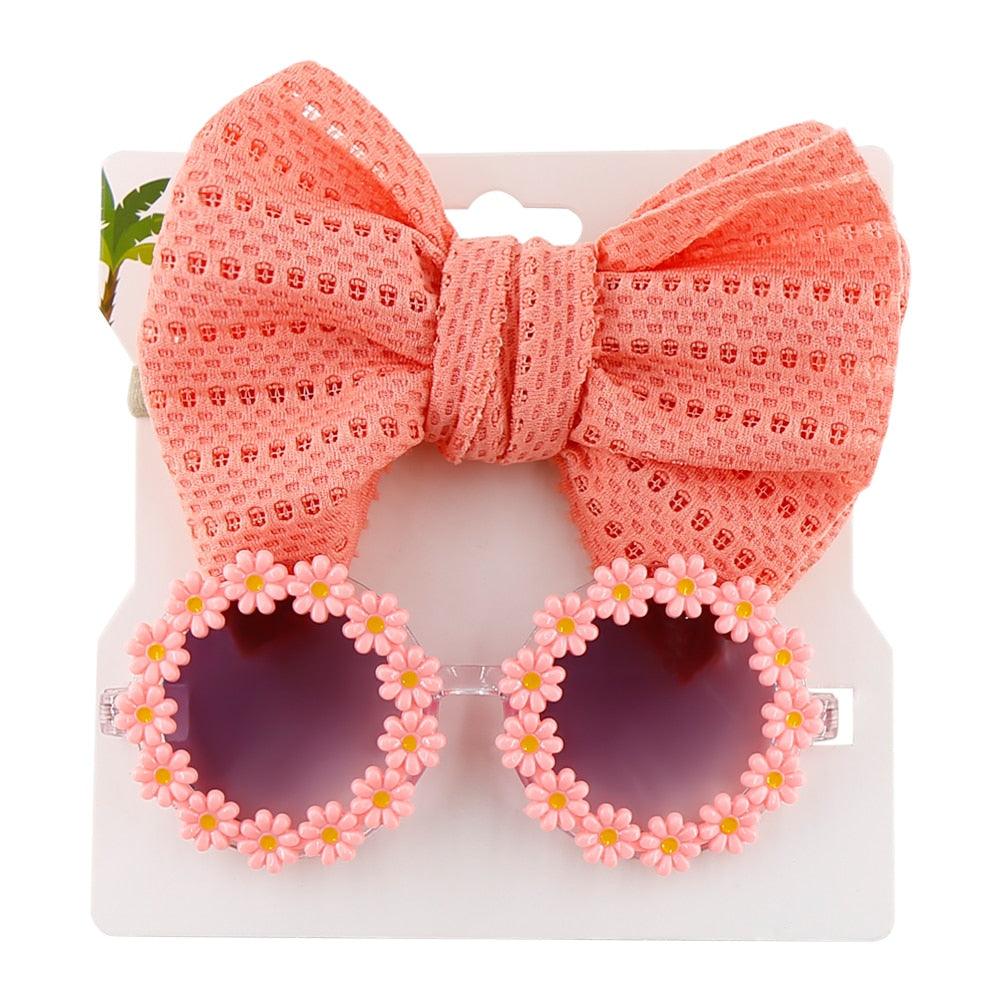 Lunettes de soleil en forme de marguerite + noeud de papillon