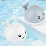 Light-up whale bath toy