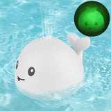 Light-up whale bath toy