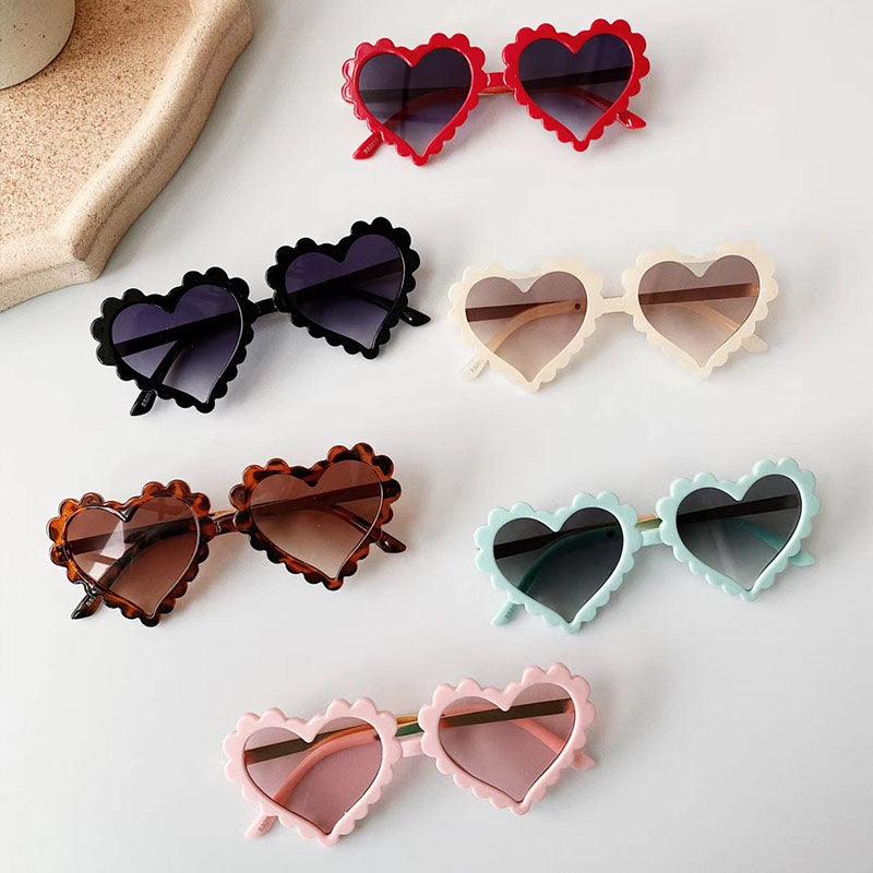 Lunettes de soleil en coeur pour enfant