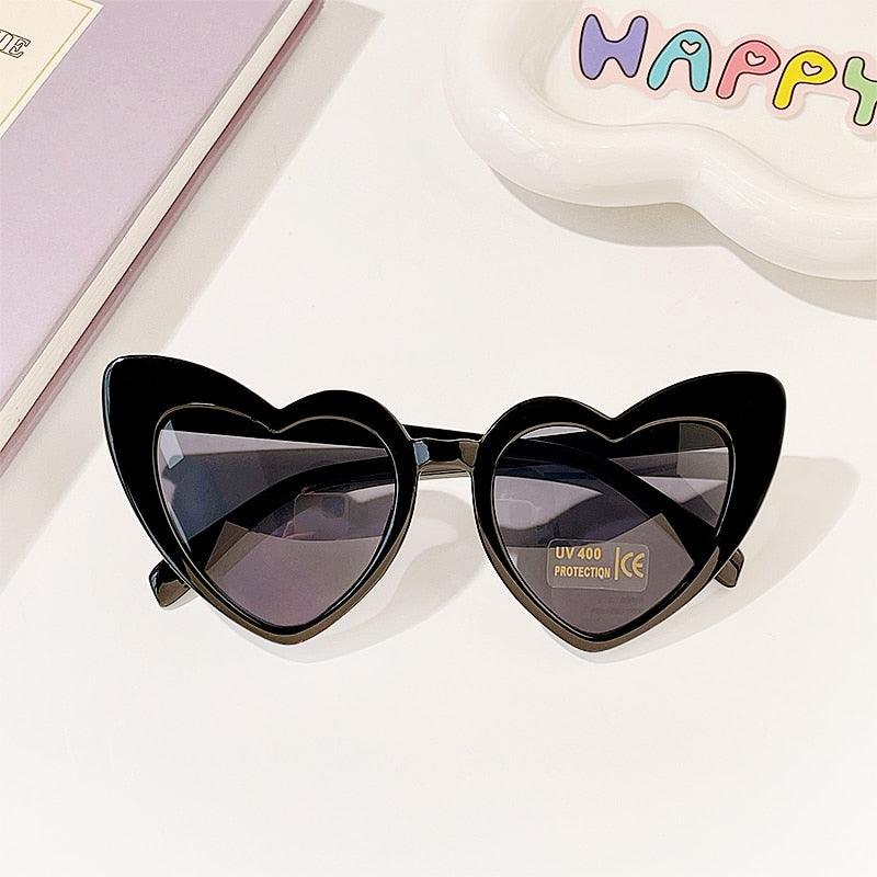 Lunettes de soleil en coeur pour enfant