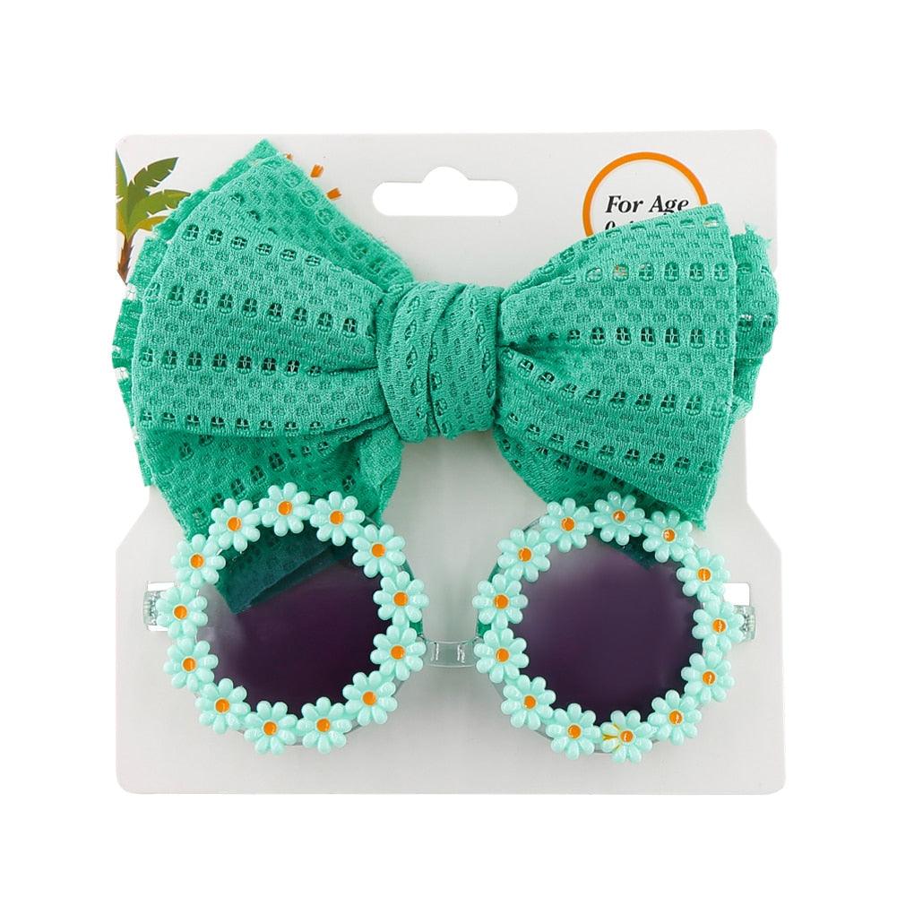 Lunettes de soleil en forme de marguerite + noeud de papillon