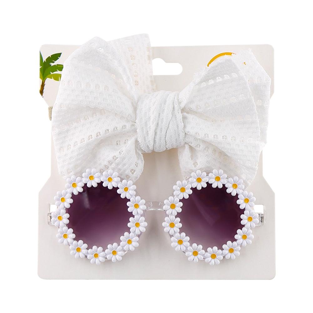 Lunettes de soleil en forme de marguerite + noeud de papillon