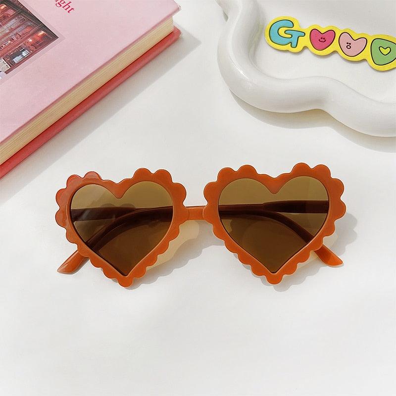 Lunettes de soleil en coeur pour enfant