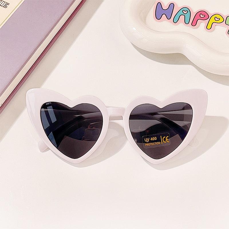 Lunettes de soleil en coeur pour enfant