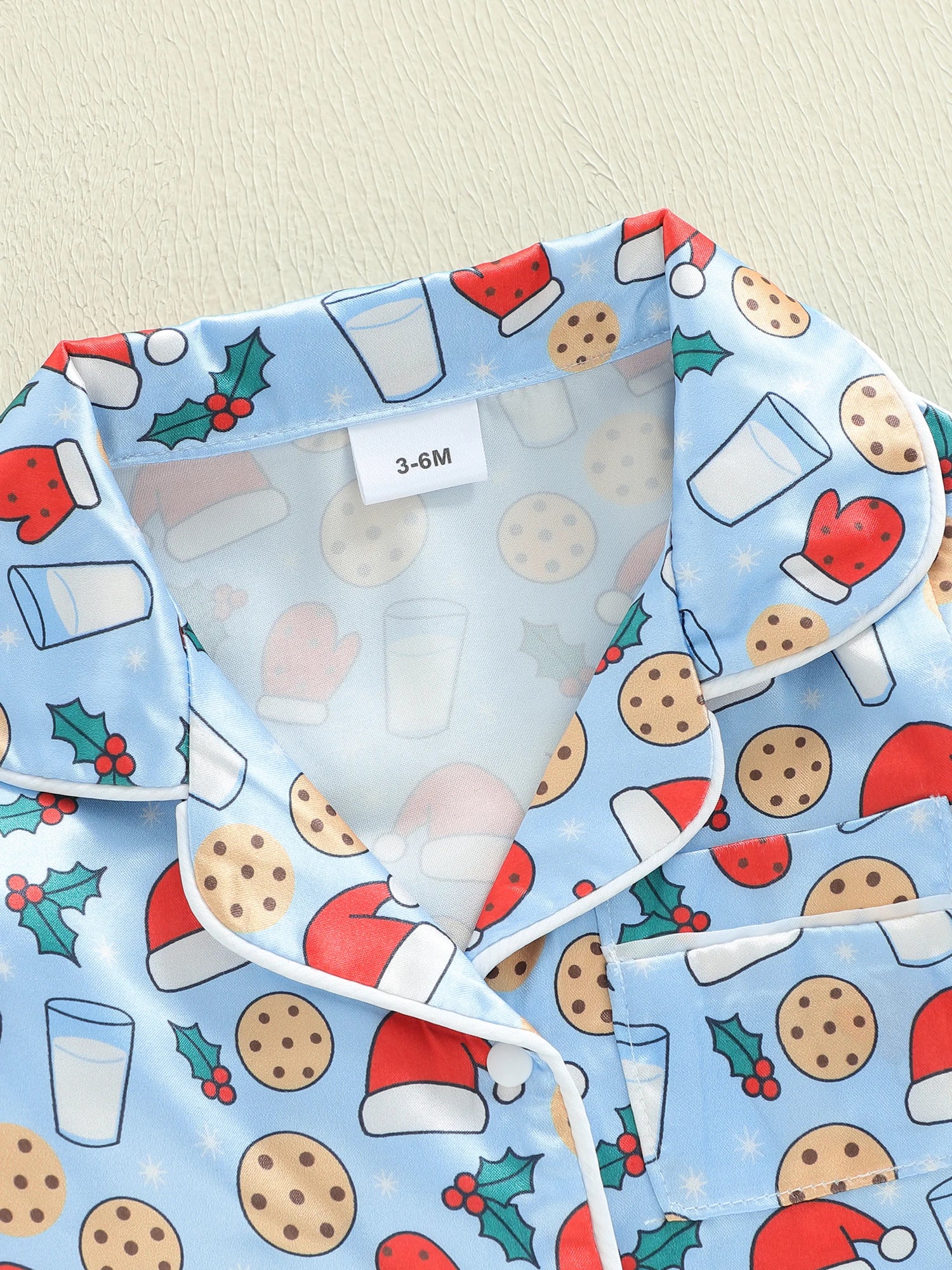Pyjama bébé sans pieds – imprimé bonnet de Noël