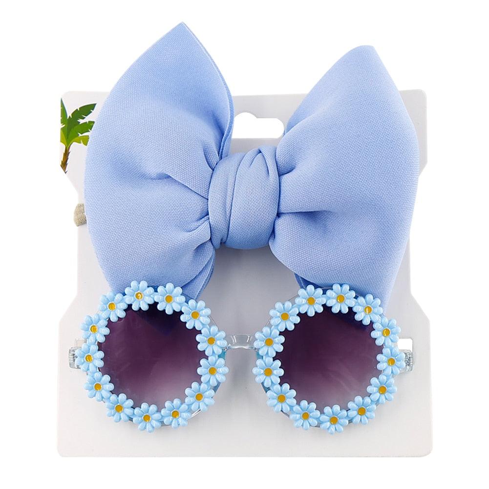 Lunettes de soleil en forme de marguerite + noeud de papillon