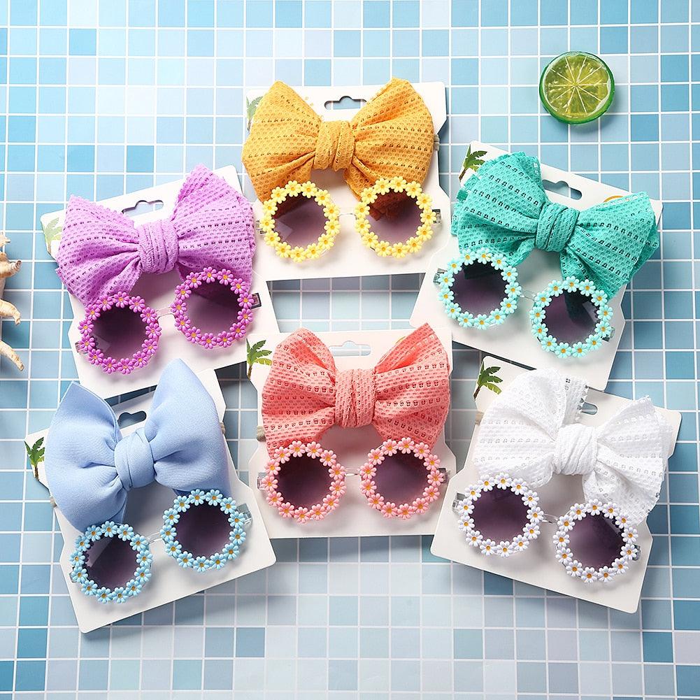 Lunettes de soleil en forme de marguerite + noeud de papillon