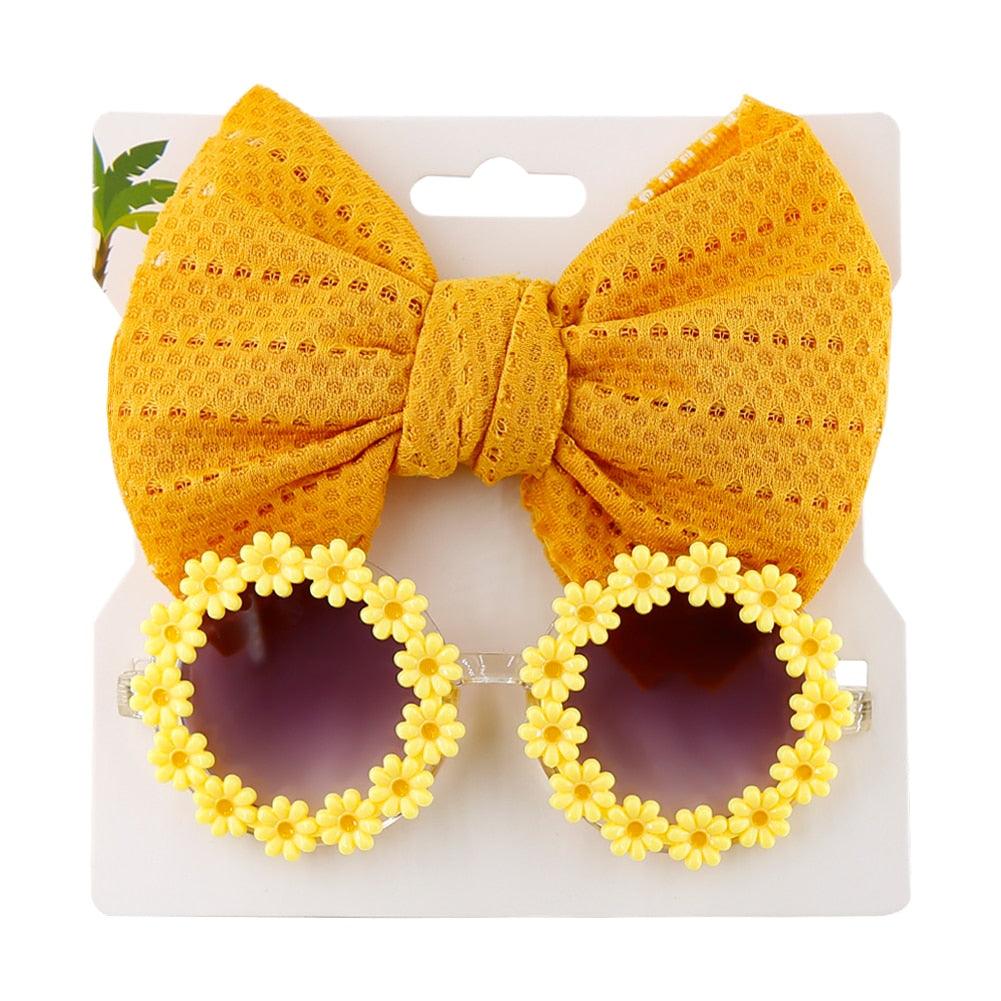 Lunettes de soleil en forme de marguerite + noeud de papillon