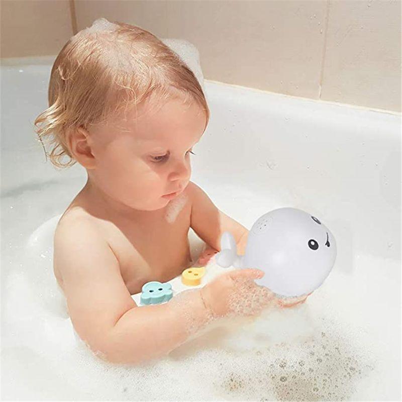 Light-up whale bath toy