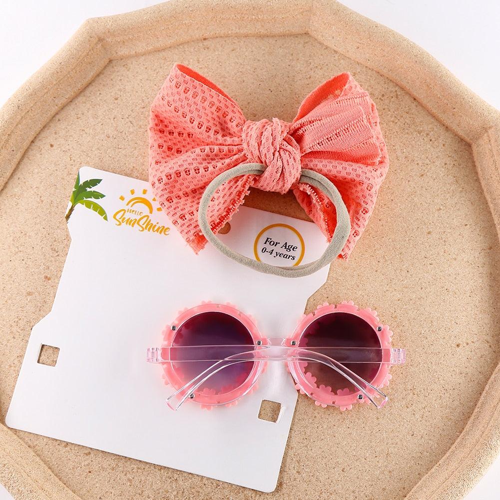 Lunettes de soleil en forme de marguerite + noeud de papillon