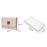 Tapis à langer de voyage pliable