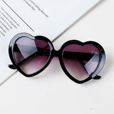 Lunettes de soleil en coeur pour enfant