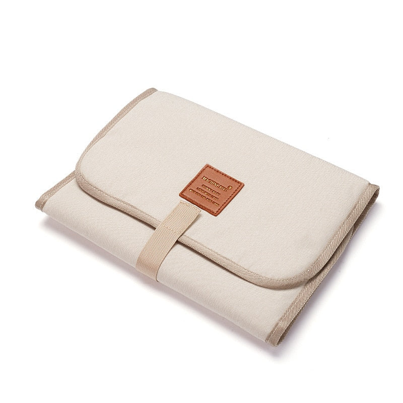 Tapis à langer de voyage pliable