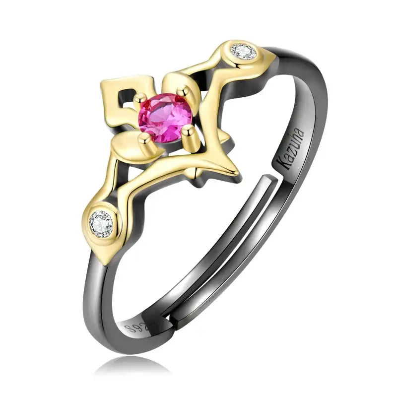 Bague genshin impact en or deux tons et noir avec pierre rose centrale et diamants clairs dans un design floral