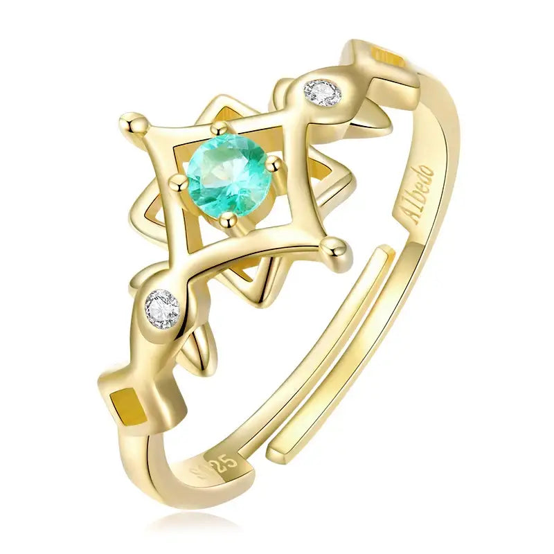 Bague genshin impact en argent avec anneau ajustable doré, pierre centrale turquoise et diamants clairs en motif étoile