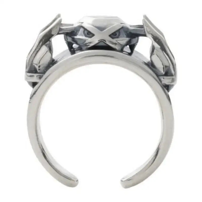 Bague pokémon metalosse metagross en argent avec design de pince détaillé et visage menaçant pokémon iconique