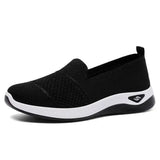 Basket ergofit femme noir en maille, slip-on avec semelle blanche, chaussure orthopédique pour femme confortable