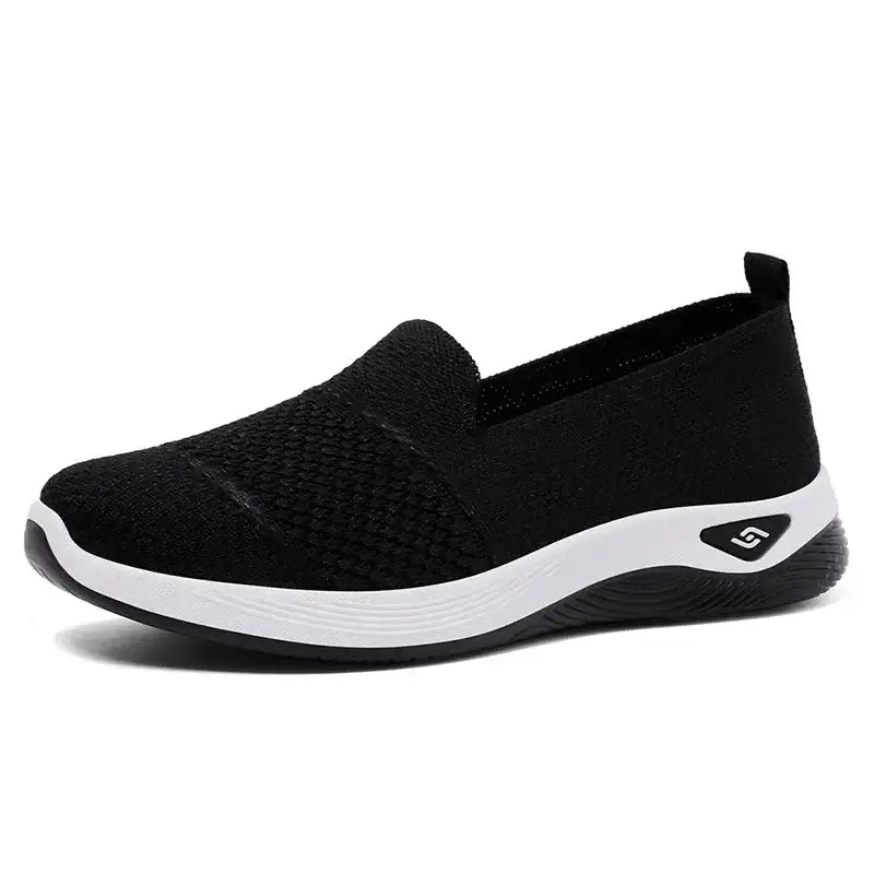 Basket ergofit femme noir en maille, slip-on avec semelle blanche, chaussure orthopédique pour femme confortable