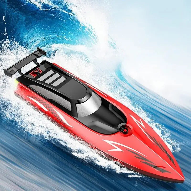 Bateau télécommandé rouge et noir avec décor éclairs blanc vitesse élevée naviguant sur eau bleue