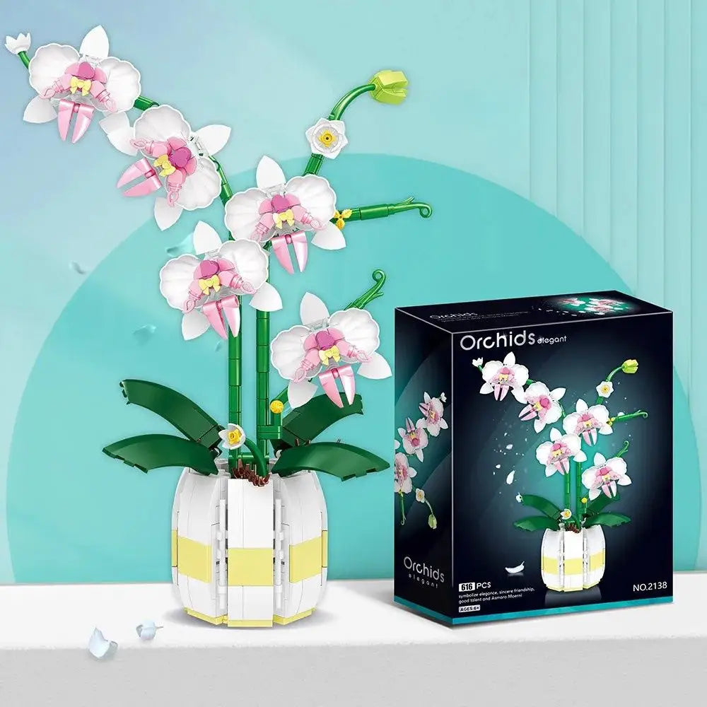 Bloc de construction orchidée en lego fleurs orchidée blanche et rose dans un pot rayé jaune et blanc