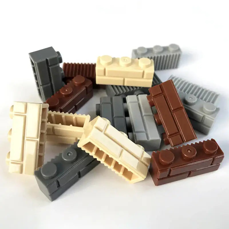 Une collection de blocs lego mur brique 60 pièces en plastique beige, marron et gris avec surfaces texturées